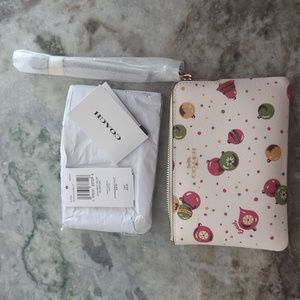 Holiday edition coach wristlet